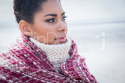 Beautiful woman wrapped up in warm clothing