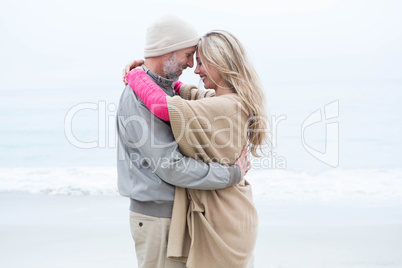 Cute couple standing and holding each other