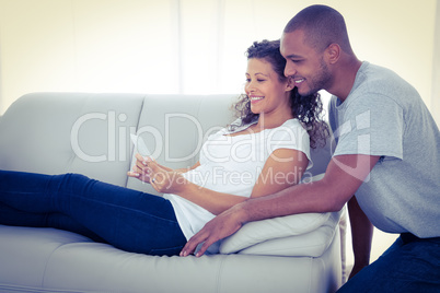 Young couple with sonogram