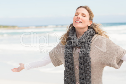 Smiling woman wearing winter clothing