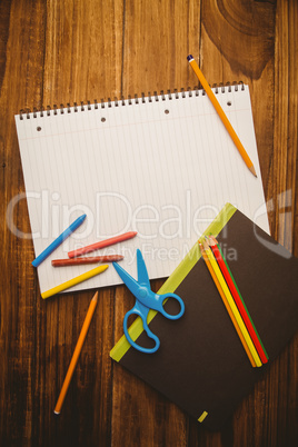 School supplies on desk with copy space