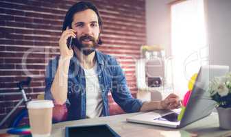 Portrait of businessman talking on the phone