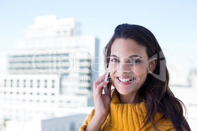 Happy pretty woman on the phone