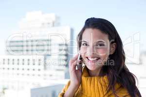 Happy pretty woman on the phone