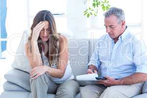 Psychiatrist advising depressed pregenat woman