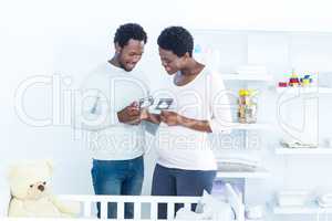 Couple discussing while holding ultrasound scan