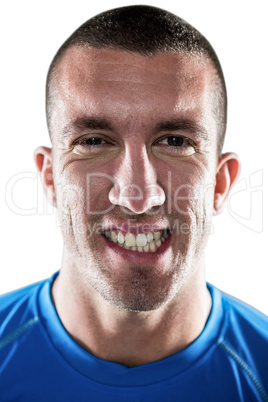 Portrait of rugby player clenching teeth