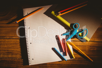 School supplies on desk with copy space