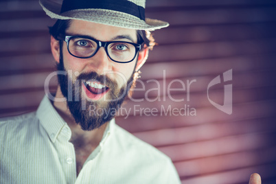 Portrait of happy man wearing hat and eyeglasses