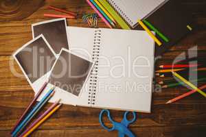 School supplies on desk with copy space