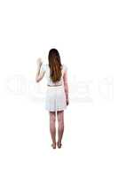 Girl in white dress waving