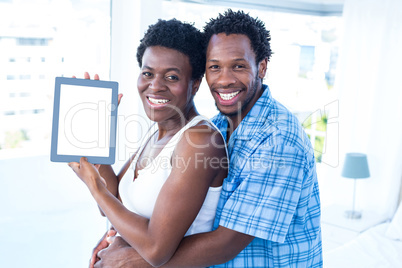 Portrait of happy couple embracing