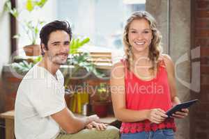 Portrait of business people posing at office