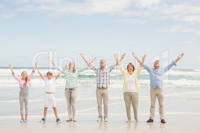 Multi generation family standing beside one another