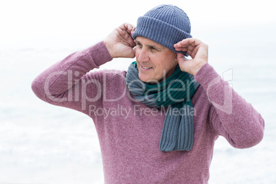 Smiling man wearing warm clothes