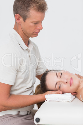 Woman receiving neck massage