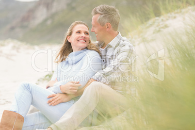 Smiling couple sitting together