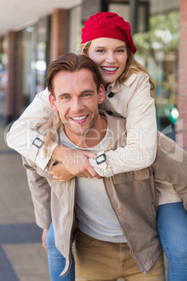 Girlfriend piggy-backing on her boyfriend