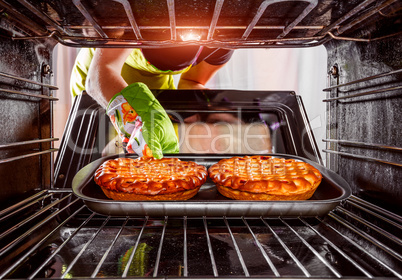 Cooking in the oven at home.