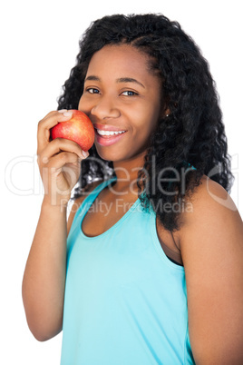 Model holding a red apple