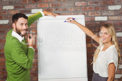 Portrait of colleague holding marker