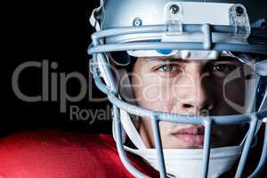 Close-up portrait of confident sportsman