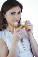 Pretty woman with herbal tea