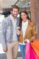 Young couple smiling while walking