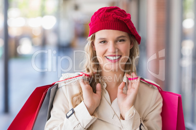 Portrait of a happy smiling woman with shopping bags