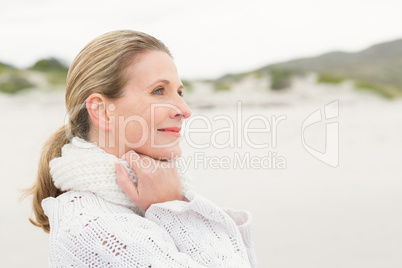 Woman standing at the shore