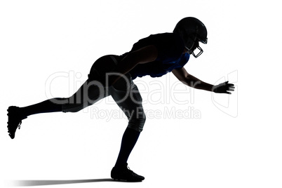 Silhouette American football player jumping