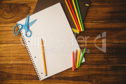 School supplies on desk with copy space