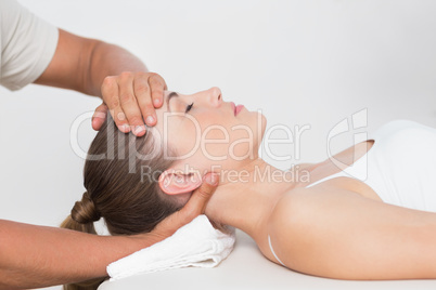 Woman receiving neck massage