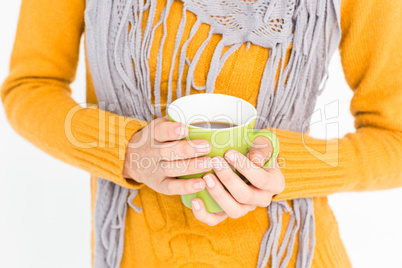 Close up of woman drinking from a cup