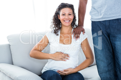 Portrait of pregnant woman with husband