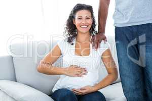 Portrait of pregnant woman with husband