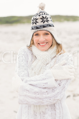 Smiling woman wearing a warm hat