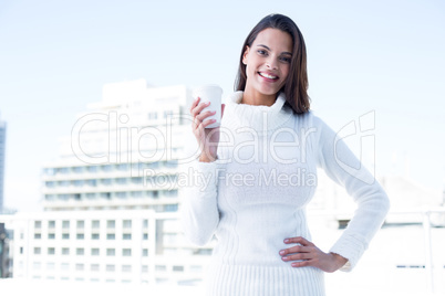 Beautiful brunette drinking a coffee