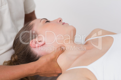 Woman receiving neck massage