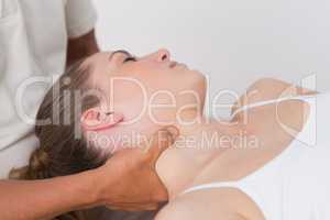 Woman receiving neck massage