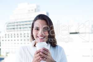 Beautiful brunette drinking a coffee