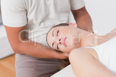 Woman receiving neck massage