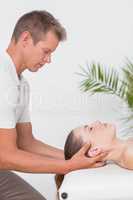 Woman receiving neck massage