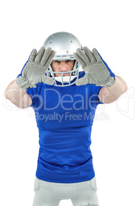 Confident American football player defending