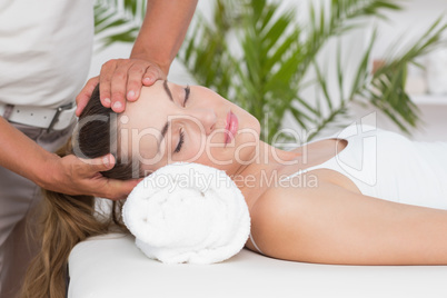 Woman receiving neck massage