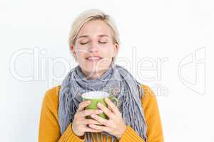 Close up of woman drinking from a cup