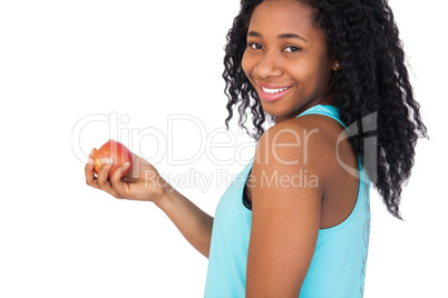 Model holding a red apple