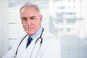 Portrait of serious doctor with stethoscope