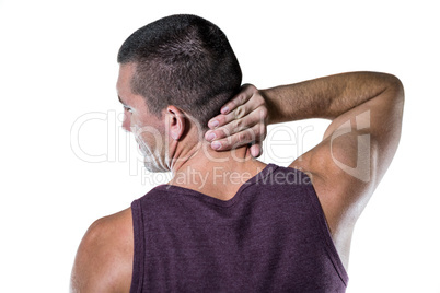 Rear view of athlete with neck pain