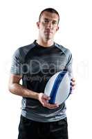 Portrait on rugby player holding ball